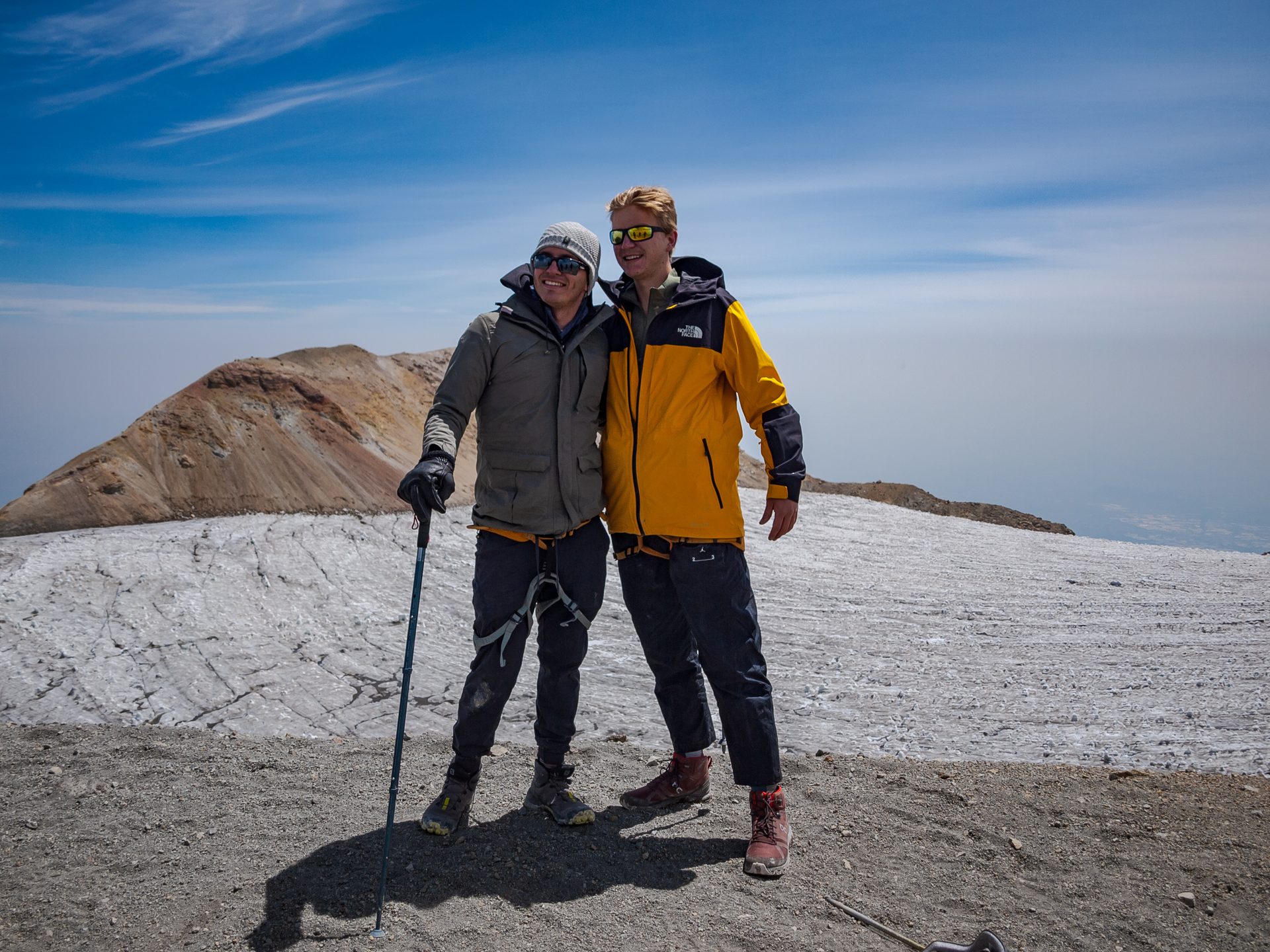 Climber reaching the Iztaccíhuatl summit — guided Mexico expedition